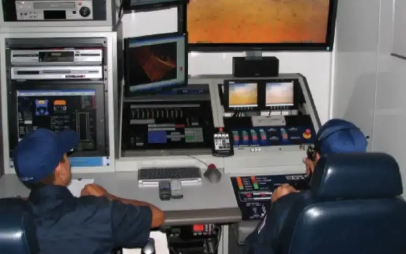 AQ-asstes-cropped38-lg two members at control panel